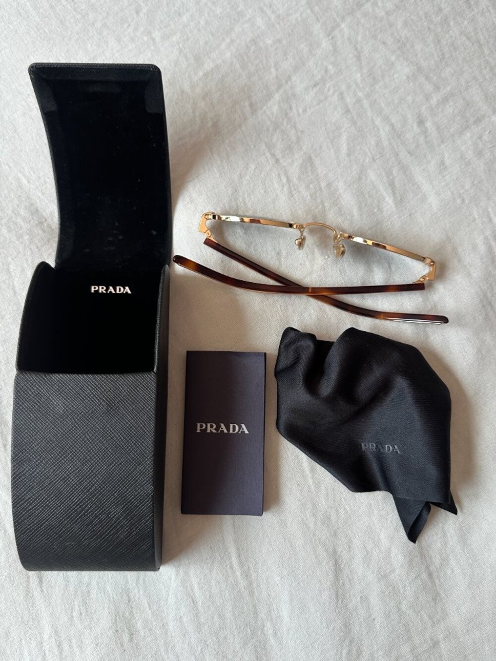 Prada Gold Sunglasses
